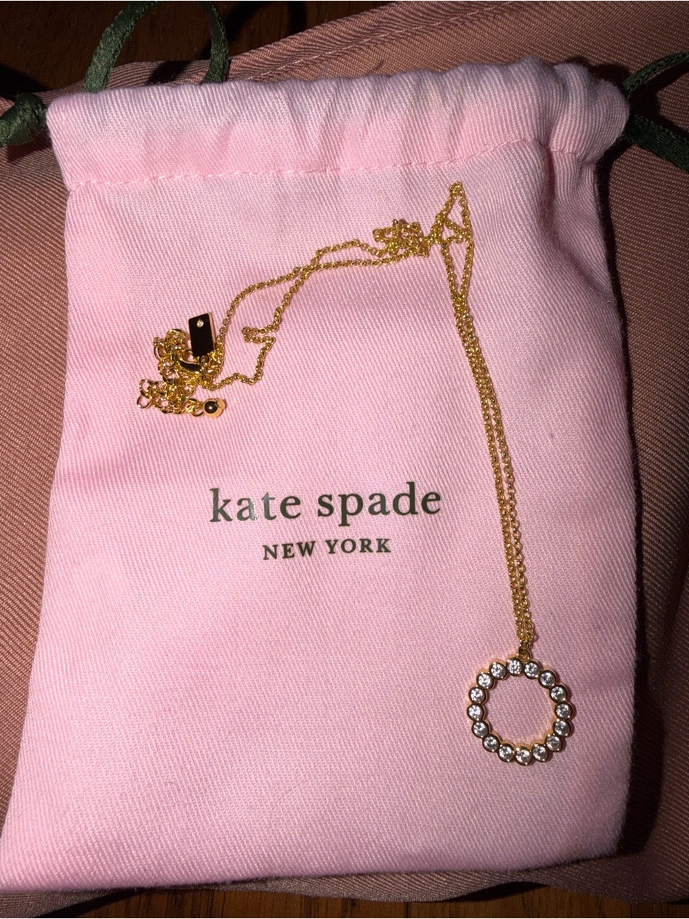 kate spade Gold Circle Pendant Necklace with Pink Pouch